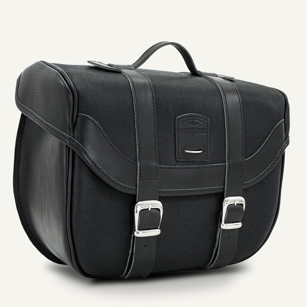 Cool black panniers moto.