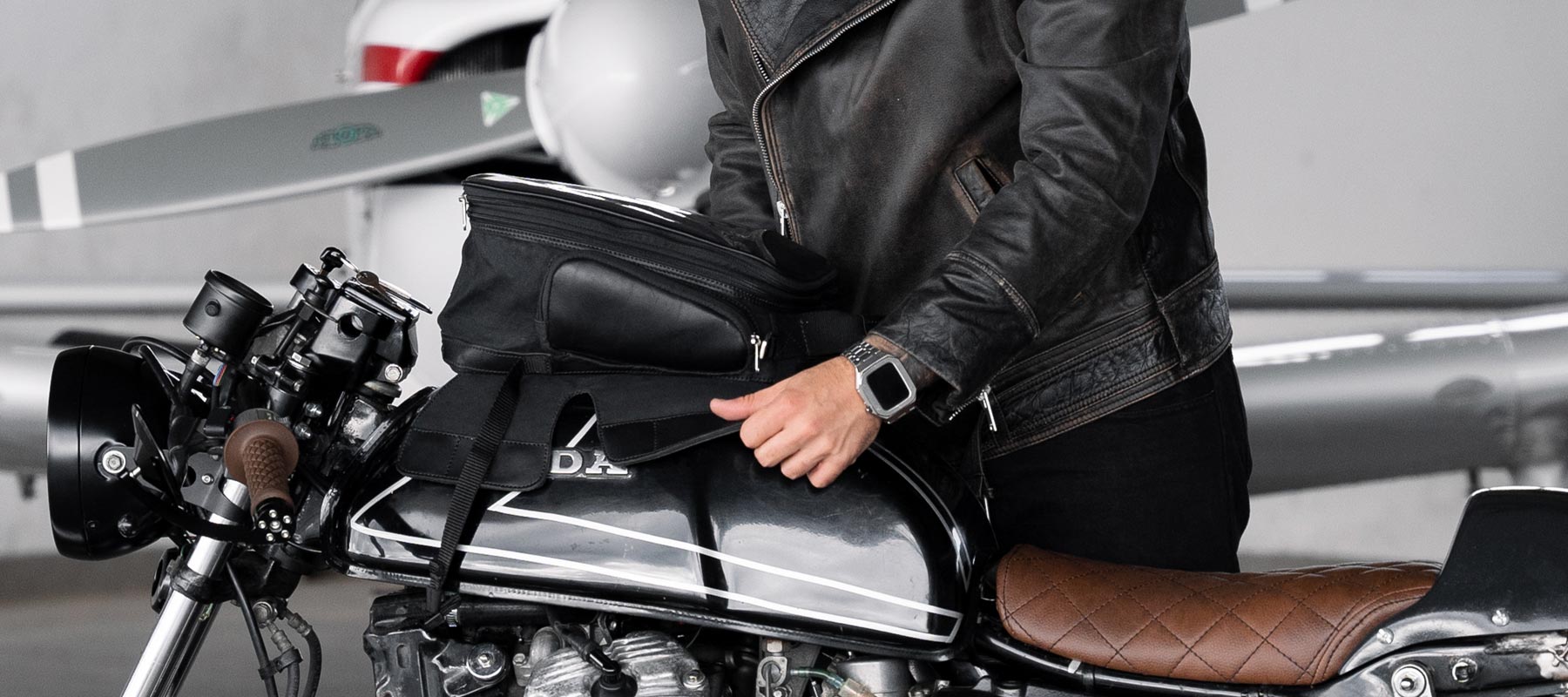 Magnetic tank bag on cafe racer style moto.