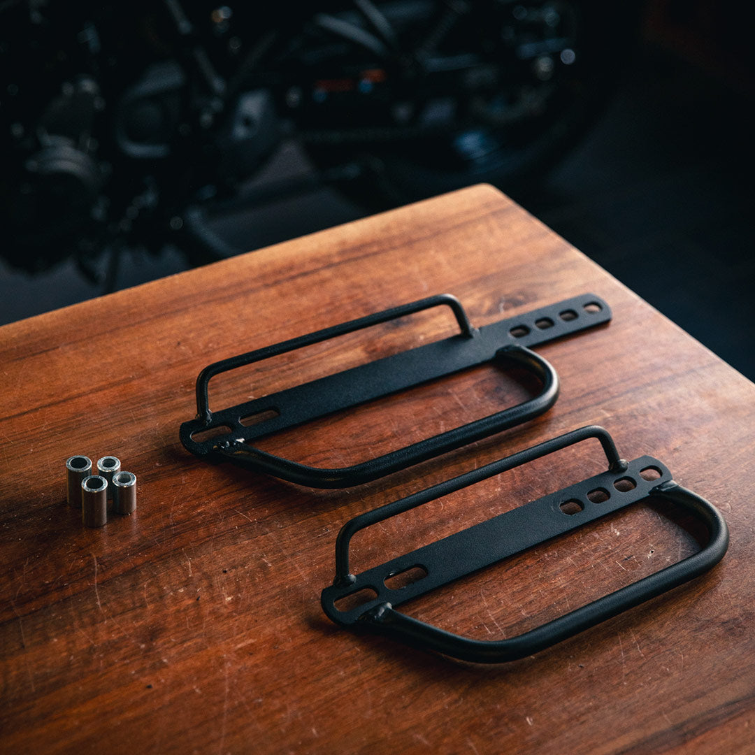 Black universal pannier racks for motorcycle.