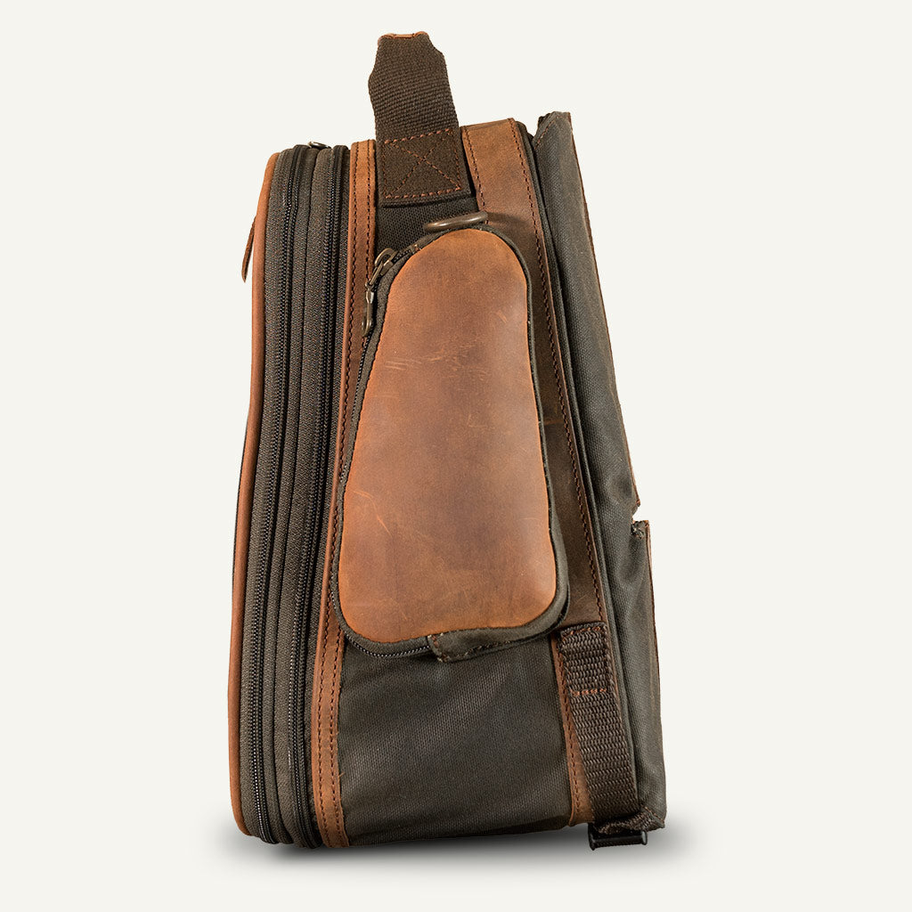 Magnetic moto tank bag with side pockets.